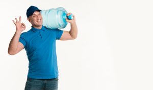 delivery-man-holding-water-bottle-making-okay-sign (1)