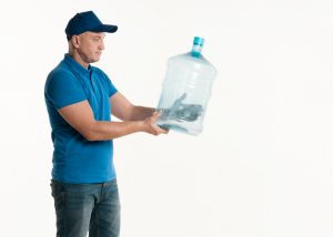 side-view-delivery-man-holding-water-bottle